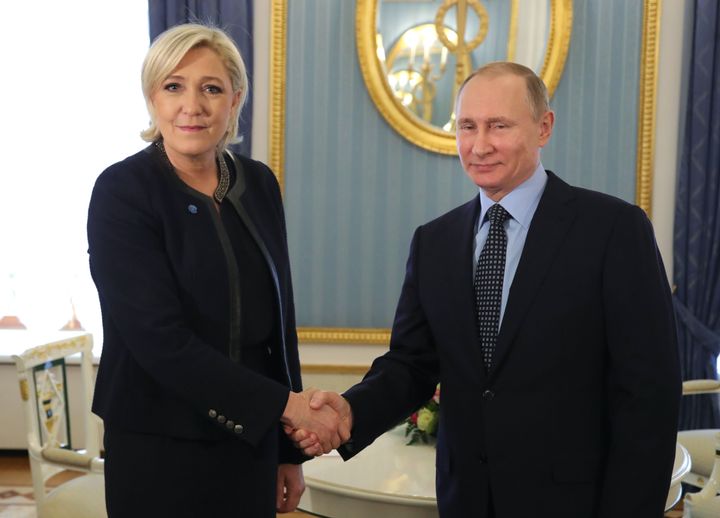 TOPSHOT - Russian President Vladimir Putin meets with French presidential election candidate for the far-right Front National (FN) party Marine Le Pen at the Kremlin in Moscow on March 24, 2017.