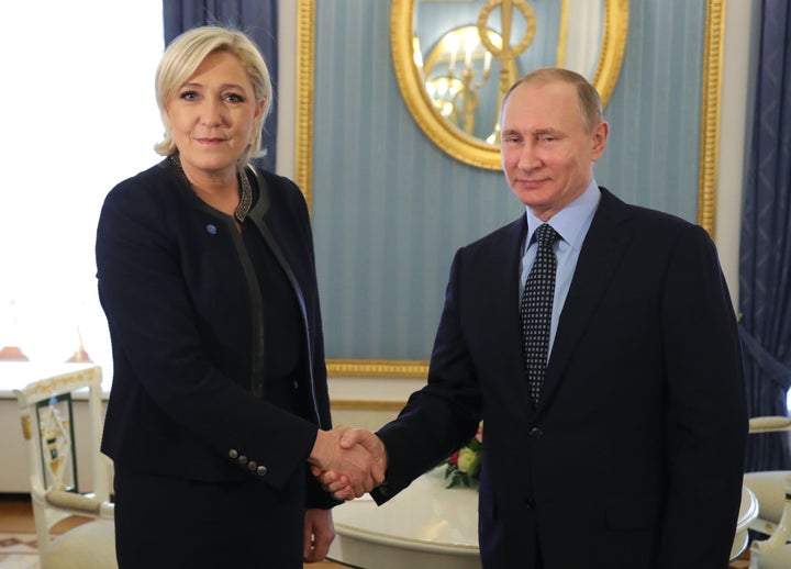 TOPSHOT - Russian President Vladimir Putin meets with French presidential election candidate for the far-right Front National (FN) party Marine Le Pen at the Kremlin in Moscow on March 24, 2017.