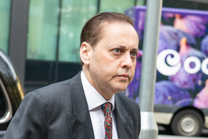 Imran Ahmad Khan arrives at Southwark Crown Court in London.