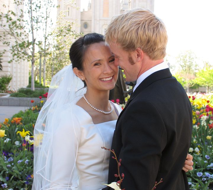 "If I didn’t adopt my husband’s surname, I’d be branded the worst kind of F-word in a conservative community: feminist," writes Allison Shiozawa Miles, pictured on her wedding day.