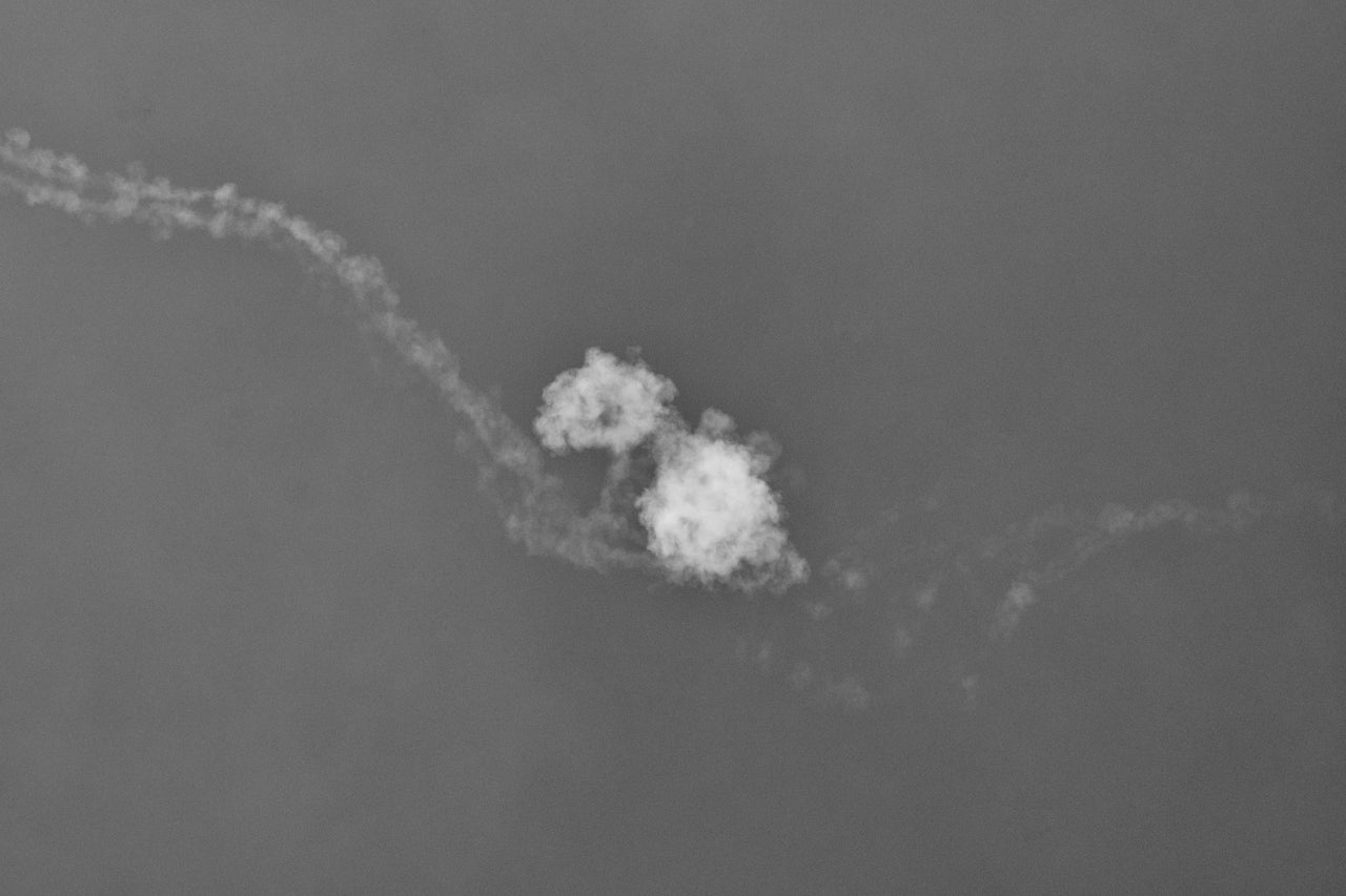A Russian missile is intercepted by a Ukrainian air-defense system in Kyiv.