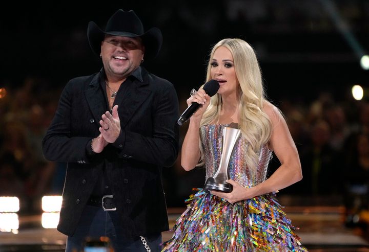 Jason Aldean, left, and Carrie Underwood won the award for single of the year for "If I Didn't Love You" at the 57th Academy of Country Music Awards on Monday.