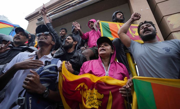 Sri Lankans demanding president Gotabaya Rajapaksa resign over the debt-ridden country’s worst economic crisis protest outside the president's office in Colombo, Sri Lanka, Sunday, April 10, 2022. (AP Photo/Eranga Jayawardena)