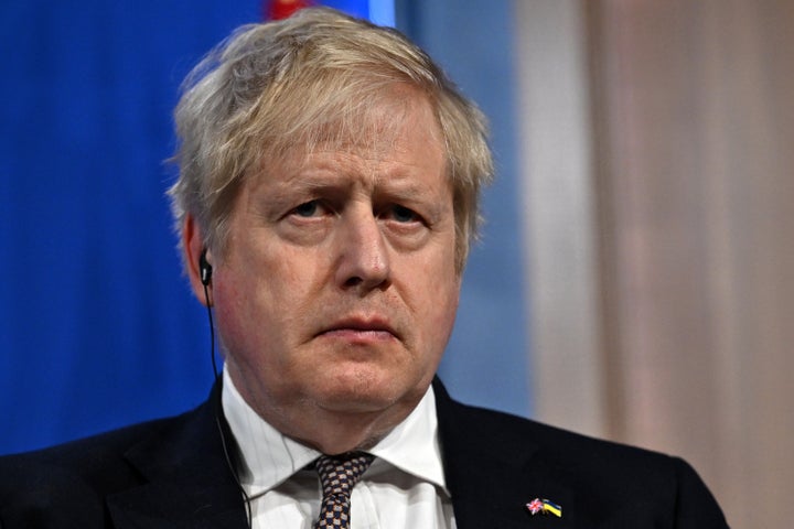 Britain's Prime Minister Boris Johnson, seen Friday, is being fined along with Chancellor Rishi Sunak for attending parties during a COVID-19 lockdown.
