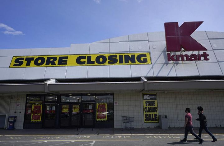 People walk into a Kmart in Avenel, N.J., Monday, April 4, 2022. When the New Jersey store closes its doors on April 16, it will leave only three remaining U.S. locations for the former retail powerhouse.