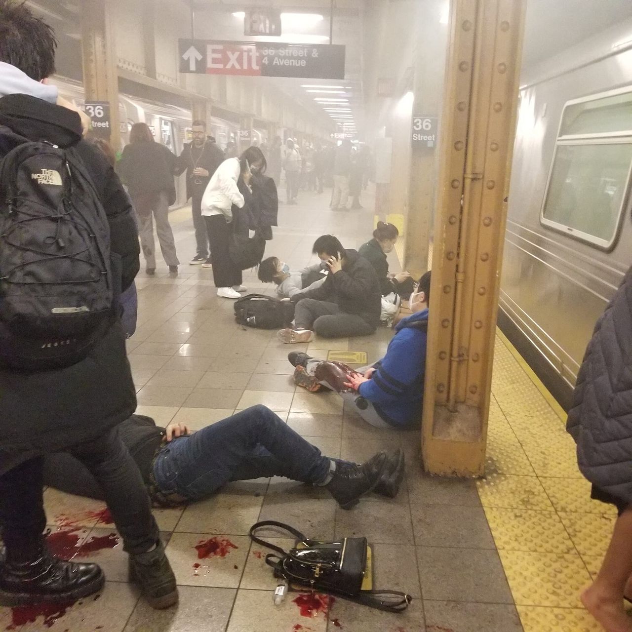Wounded people at the 36th Street subway station after the shooting.