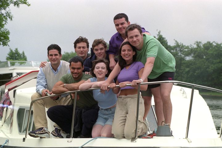 Melanie (bottom, centre) with some of her former EastEnders co-stars