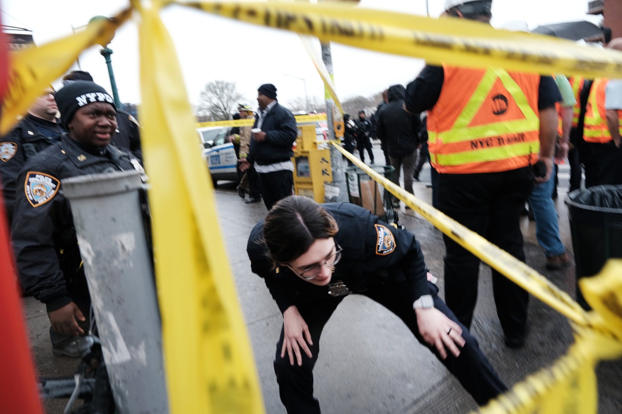 Police and emergency responders at the site of the shooting. 