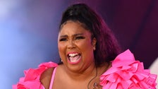 Lizzo Boards Plane Nearly Naked To Reveal Exciting News