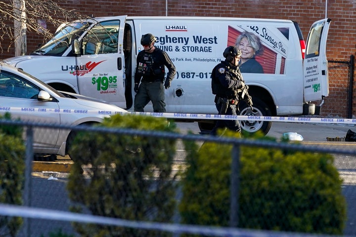 Bomb squad personnel search a U-Haul truck during an ongoing investigation in the Brooklyn borough of New York.