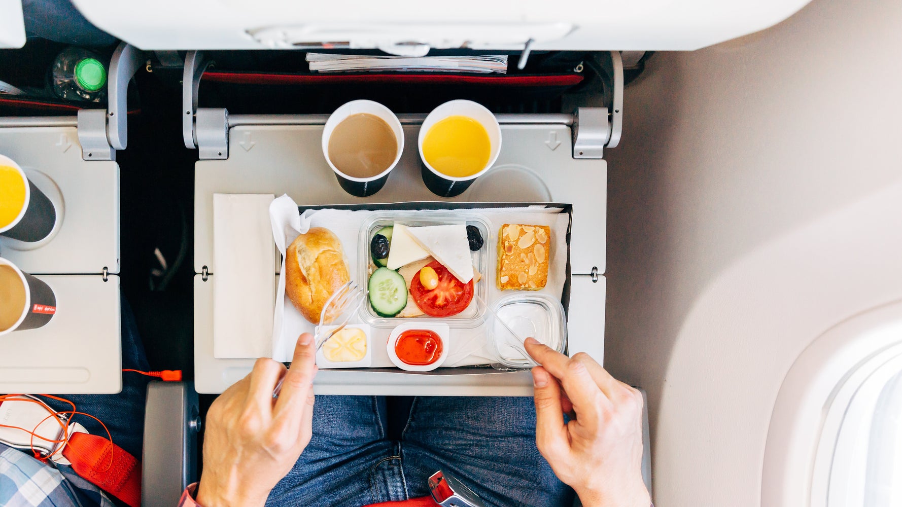 The Best And Worst Foods To Eat On A Plane, According To Nutritionists