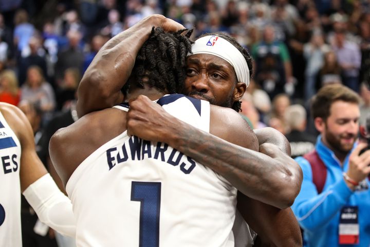 Patrick Beverley and Anthony Edwards celebrate the Timberwolves' victory. 