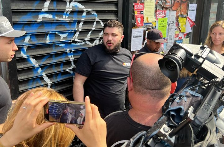 Security camera installer Zack Tahhan, seen here speaking to the press, helped alert authorities to the whereabouts of Frank R. James, who was suspected of shooting 10 people in Brooklyn Tuesday.