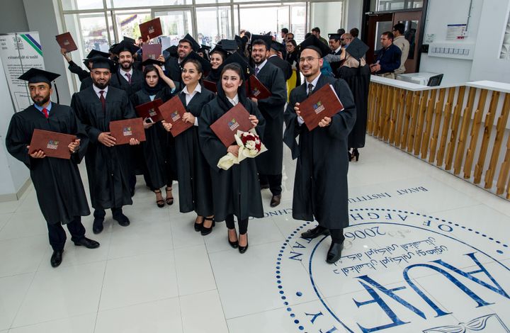 More than 100 Afghan students from the American University of Afghanistan celebrate after receiving their diplomas at a graduation ceremony on campus on May 21, 2019, in western Kabul, Afghanistan.