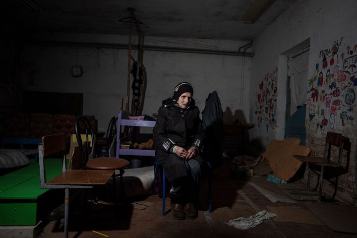 Valentina Saroyan sits in the basement of a school in Yahidne, near Chernihiv, Ukraine, on April 12, 2022.