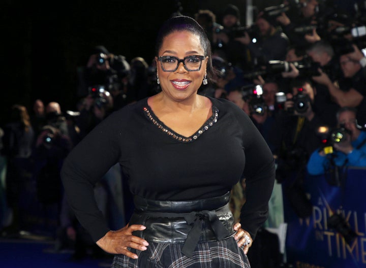 FILE - In this March 13, 2018, file photo, actress Oprah Winfrey poses for photographers upon arrival at the premiere of the film "A Wrinkle In Time" in London. Winfrey and the Smithsonian Channel are partnering up to highlight the racial disparities in the healthcare system through a new campaign and documentary. The network revealed on Thursday the Color of Care campaign to create a solution toward health equity. The campaign will follow the premiere of Winfrey’s “The Color of Care” documentary, which airs May 1. (Photo by Joel C Ryan/Invision/AP, File)