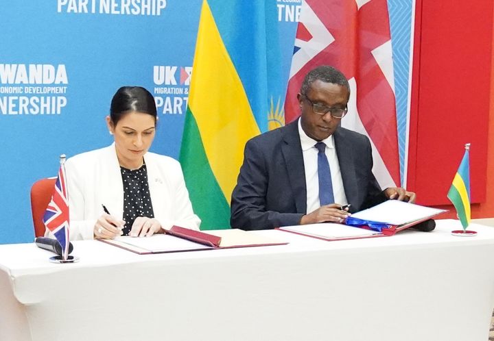 Home Secretary Priti Patel and Rwandan minister for foreign affairs and international co-operation, Vincent Biruta, sign the migration and economic development partnership in Kigali.
