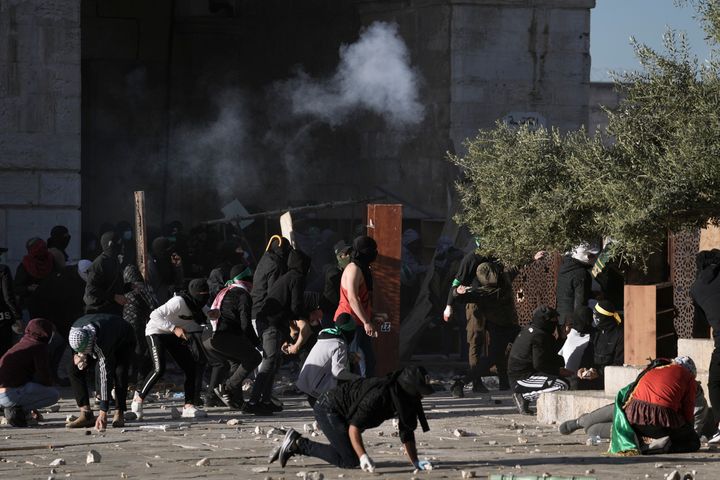 Videos circulating online showed Palestinians hurling rocks and fireworks and police firing tear gas and stun grenades.