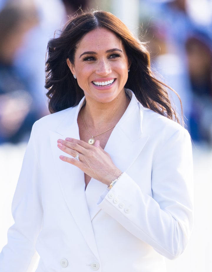 Meghan Markle, Prince Harry Make Their First Appearance After Surprise Visit With The Queen 2 The Duchess of Sussex attends a reception for friends and family of competitors of the Invictus Games at Nations Home at Zuiderpark on Friday.