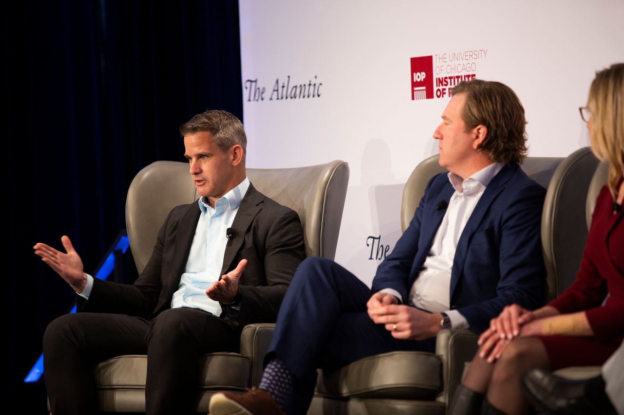 Kinzinger (left) spoke at a conference on disinformation put on by the University of Chicago's Institute of Politics on April 8.