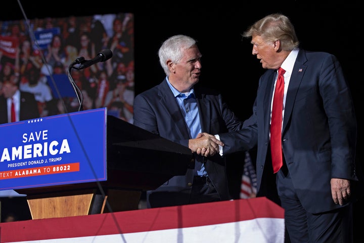 Former U.S. President Donald Trump welcomes candidate for U.S. Senate and Rep. Mo Brooks (R-Al.) to the stage during a "Save America" rally at York Family Farms on Aug. 21, 2021, in Cullman, Alabama.