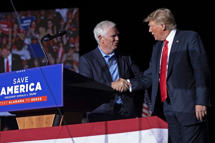 Former U.S. President Donald Trump welcomes candidate for U.S. Senate and Rep. Mo Brooks (R-Al.) to the stage during a "Save America" rally at York Family Farms on Aug. 21, 2021, in Cullman, Alabama.
