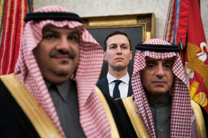 White House senior adviser Jared Kushner stands among Saudi officials as President Donald Trump talks with Crown Prince Mohammad bin Salman in 2018.
