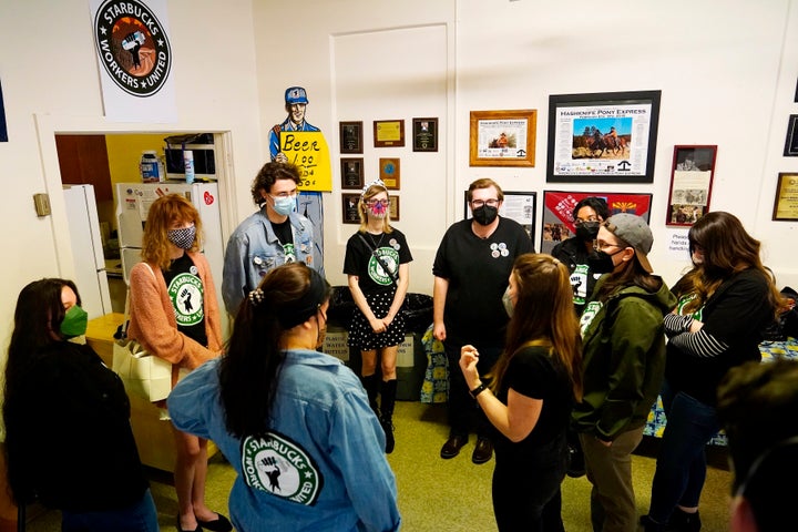 Michelle Eisen, fourth from right, speaks to members of the union campaign. 