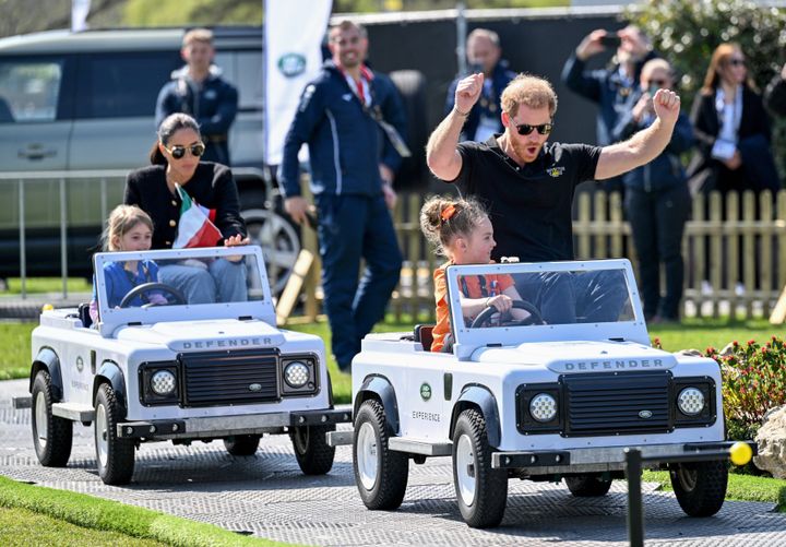 The Duke and Duchess of Sussex and their "drivers" at the Jaguar Land Rover Challenge. 