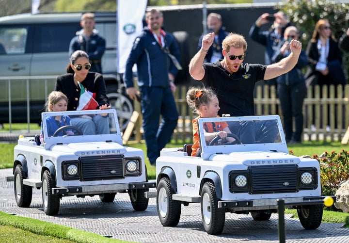 The Duke and Duchess of Sussex and their "drivers" at the Jaguar Land Rover Challenge. 