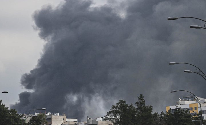 Smoke is seen rising over Darnytskyi District of Kyiv, Ukraine on April 16, 2022.