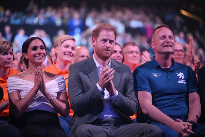 The royal couple watch at the Invictus Games opening ceremonies.
