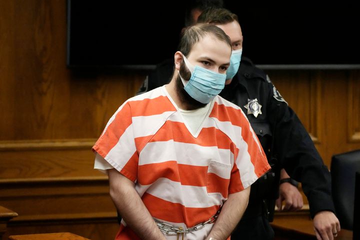 FILE - Ahmad Al Aliwi Alissa, the man accused of killing multiple people at a Colorado supermarket in March 2021, is led into a courtroom for a hearing, Sept. 7, 2021, in Boulder, Colo. A judge ruled Friday, April 15, 2022, that Alissa, charged with killing 10 people at a Colorado supermarket last year is still mentally incompetent to stand trial, further delaying court proceedings in the case. (AP Photo/David Zalubowski, Pool, File)