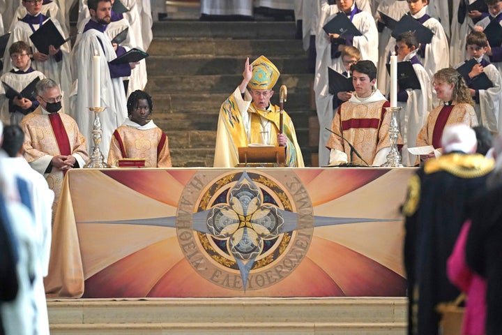 The Archbishop of Canterbury Justin Welby leads the Easter Sung Eucharist at Canterbury Cathedral in Kent, England, Sunday April 17, 2022. The leader of the Anglican church strongly criticized the British government’s plan to put some asylum-seekers on one-way flights to Rwanda, saying “sub-contracting out our responsibilities” to refugees cannot stand up to God’s scrutiny. (Gareth Fuller/PA via AP)