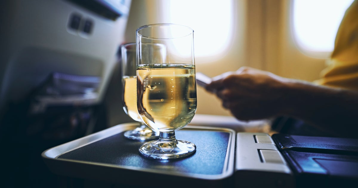 How Alcohol Affects Your Body When You're On A Flight