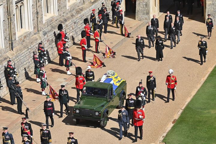 The Duke of Edinburgh’s coffin, covered with His Royal Highness’ personal standard, is seen on the purpose-built Land Rover.