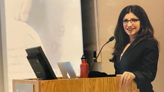 Presenting my dissertation 10 years ago. If you look closely, the screen shows the title of my talk, which was all about obesity and daily weighing.