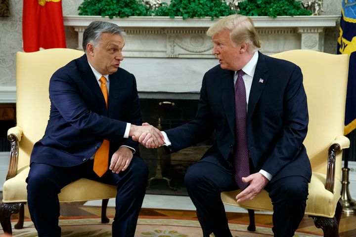 Trump shakes hands with Orbán in the Oval Office during a 2019 visit.