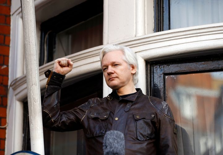Julian Assange greets supporters outside the Ecuadorian embassy in London, May 19, 2017. A British appellate court has opened the door for Julian Assange to be extradited to the U.S., overturning a lower court ruling that found his mental health was too fragile to withstand the American criminal justice system. 