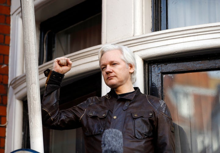 Julian Assange greets supporters outside the Ecuadorian embassy in London, May 19, 2017. A British appellate court has opened the door for Julian Assange to be extradited to the U.S., overturning a lower court ruling that found his mental health was too fragile to withstand the American criminal justice system.