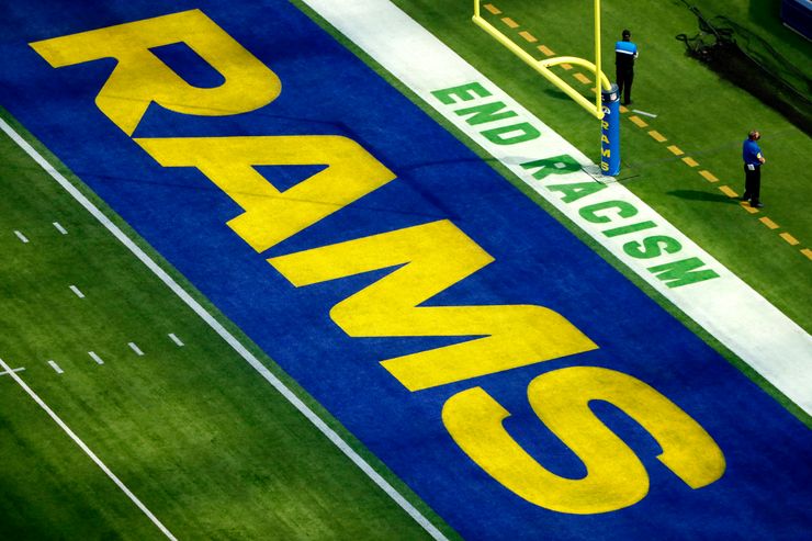The end zone at SoFi Stadium reads "End Racism" during the first quarter between the Los Angeles Rams and the Detroit Lions on Oct. 24, 2021, in Inglewood, California.