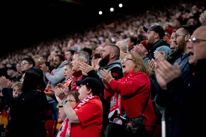 LIVERPOOL, ENGLAND - APRIL 19: Liverpool fans observe a minutes applause to show support for Cristiano Ronaldo of Manchester United during the Premier League match between Liverpool and Manchester United at Anfield on April 19, 2022 in Liverpool, England. (Photo by Ash Donelon/Manchester United via Getty Images)