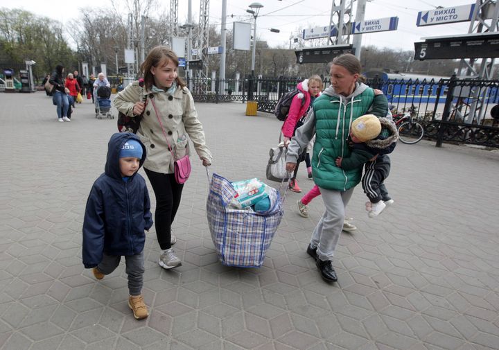 Refugees from Mykolaiv and nearby regions arrive during their evacuation at the railway station in Odessa, Ukraine.
