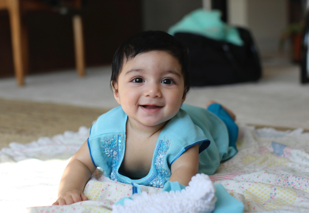 Rehma, six months old, at her uncle's wedding in July 2012.