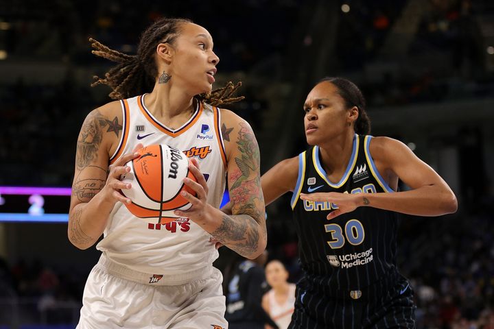 Brittney Griner #42 of the Phoenix Mercury (left) is defended by Azurá Stevens #30 of the Chicago Sky during the first half of Game Four of the WNBA Finals in 2021. 