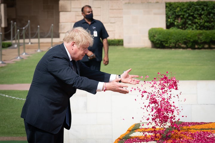 Prime Minister Boris Johnson attends Gandhi's memorial at Raj Ghat in New Delhi where he laid a wreath in tribute to the late Indian leader. 