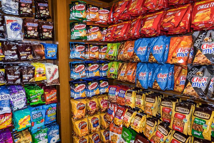 This wall of airport snack options is full of no-nos — lots of salt and sugar.