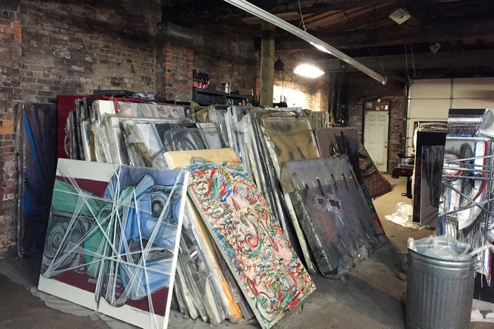 Paintings by Francis Hines sit wrapped in plastic in a barn Sept. 27, 2017, in Watertown, Conn. (Jared Whipple via AP)