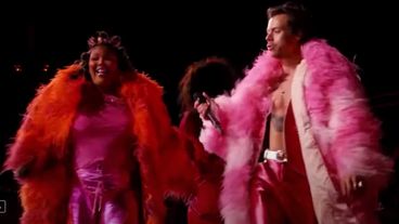 Lizzo Sparkled in Pink Jumpsuit and Feathers for NYC Show