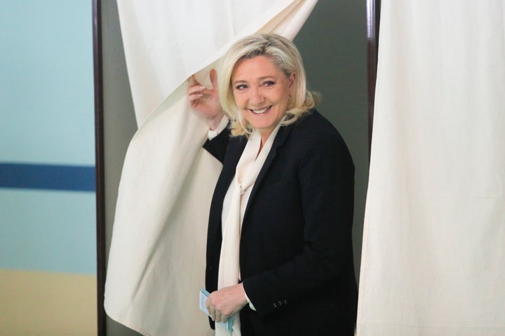 French far-right contender Marine Le Pen casts her vote in Henin-Beaumont, northern France, Sunday, April 24, 2022. (AP Photo/Michel Spingler)